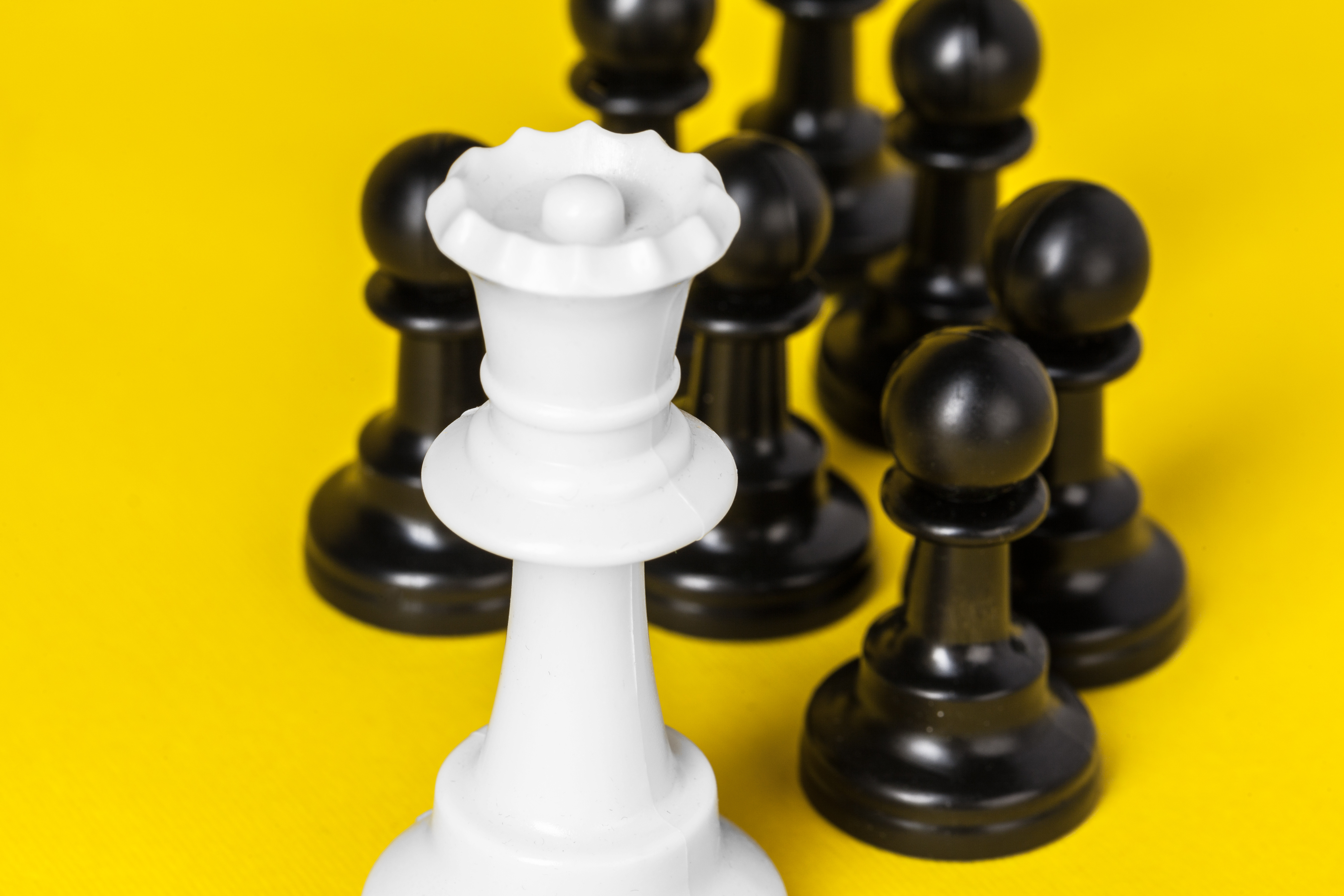 chess-figures-on-yellow-background-top-view-copy-s-2023-11-27-05-32-09-utc