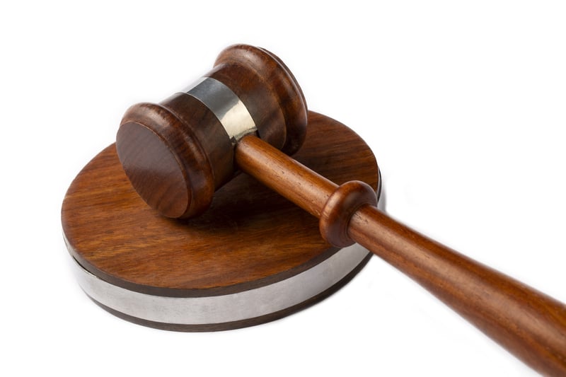 judge-gavel-representing-justice-on-a-white-backgr-2024-03-21-17-36-34-utc
